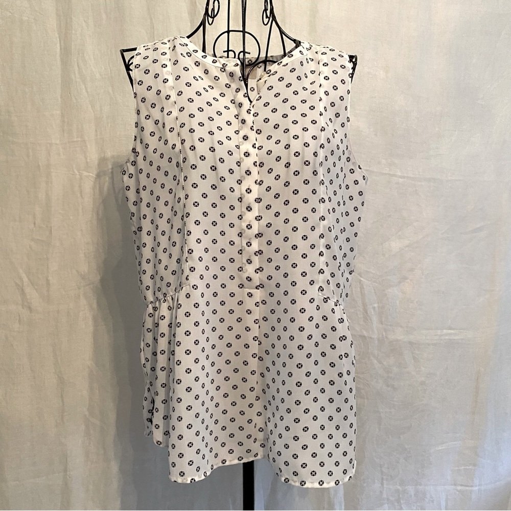 Loft extra small sleeveless top.  White with black detail.